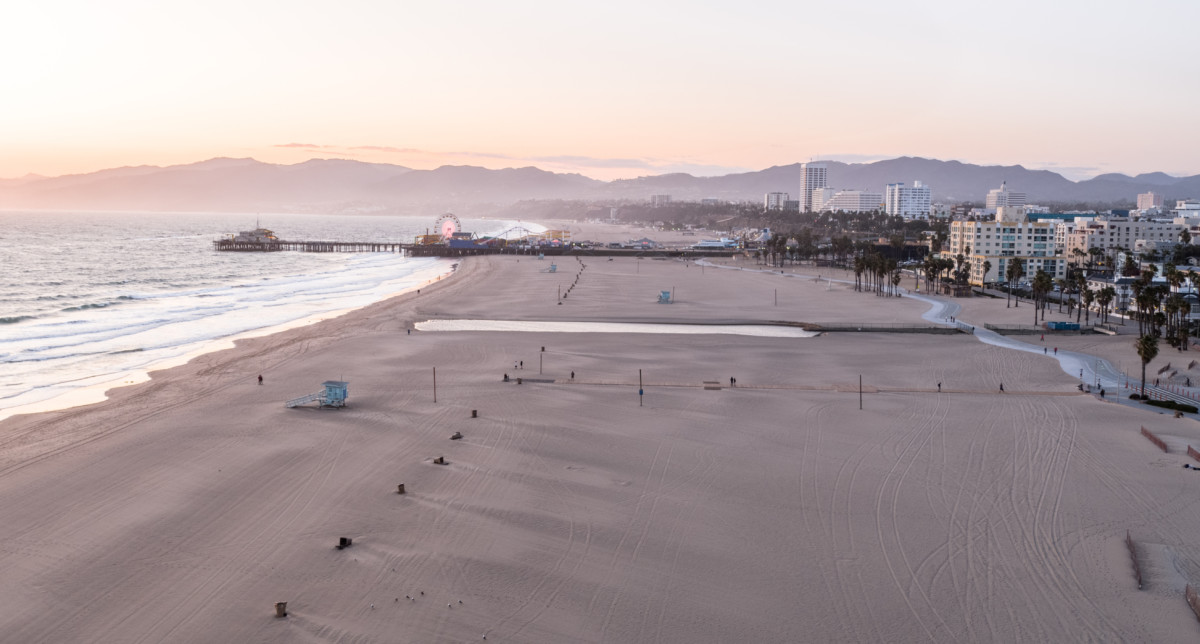 Aerial shot of the famous Santa Monica Beach and Pier, tourist attractions in Los Angeles California _ getty