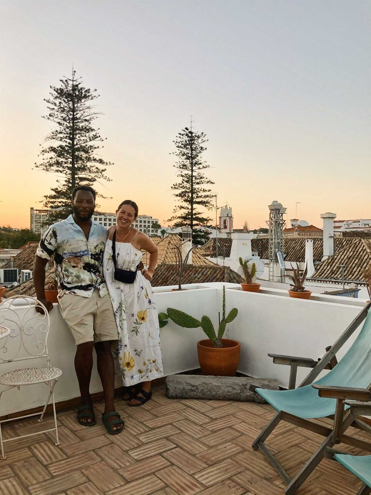 Erin McKee and Solomon on a balcony