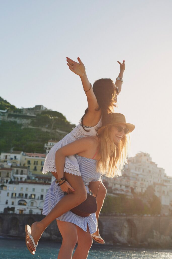 One woman with a friend on her back enjoying the sights in Europe