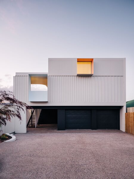 A Crisp White One-Bed Addition Is Parked Atop a Two-Car Garage in Tasmania