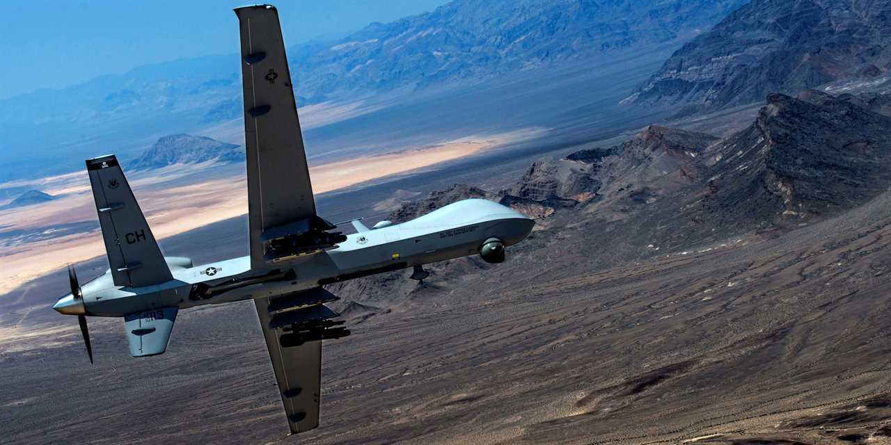 An MQ-9 Reaper remotely piloted drone aircraft performs aerial maneuvers over Creech Air Force Base, Nevada, in June 2015.