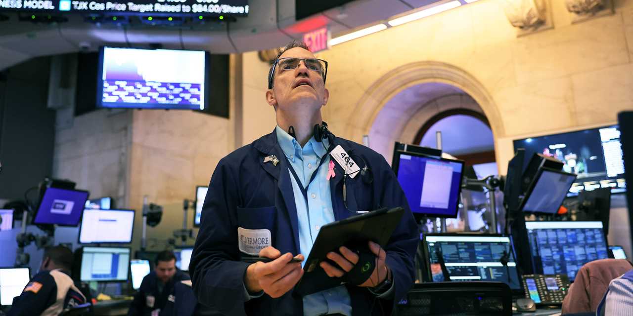 Stock trader Greg Rowe Traders works on the floor of the New York Stock Exchange during morning trading on November 17, 2022 in New York City.