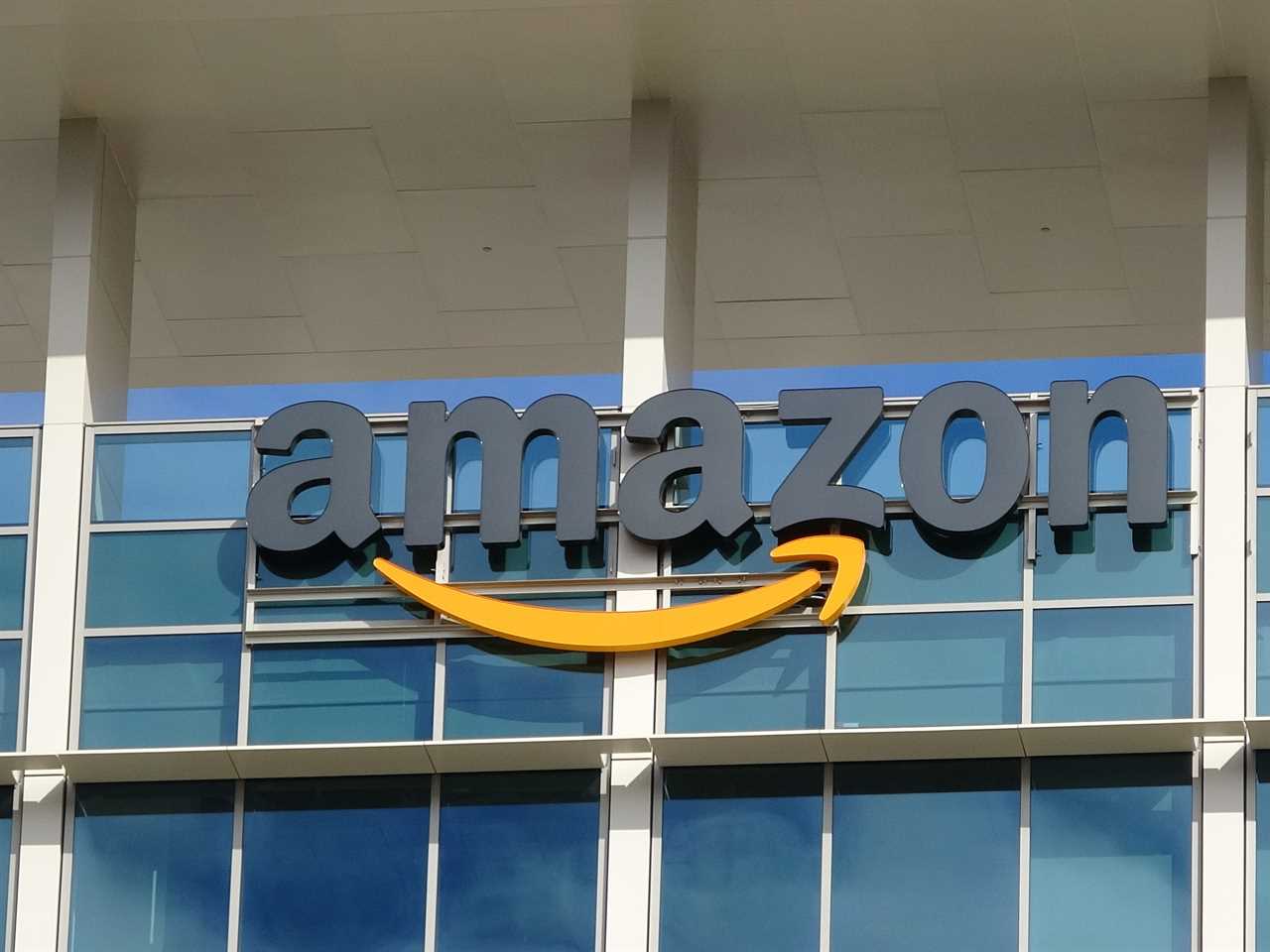 An Amazon logo on the side of a building.