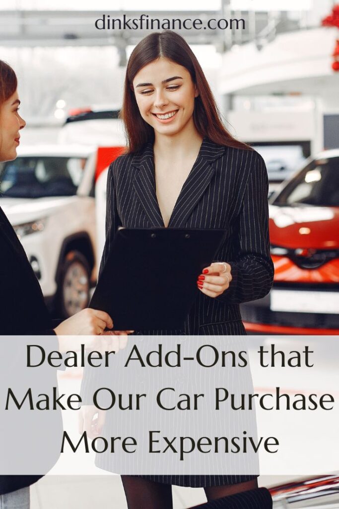 Woman at a Car Dealership Talking to a Female Sales Woman