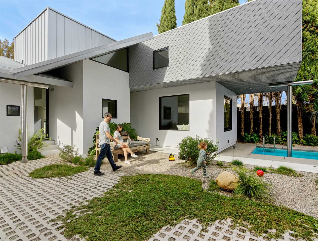 Sometimes Building Your Dream Home Means Putting a Pole Through Your Pool