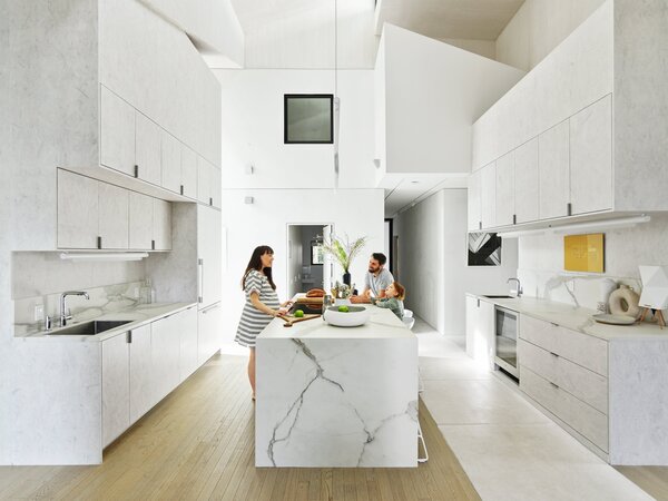 A vaulted roof over the center of the home caps a showstopping kitchen. 