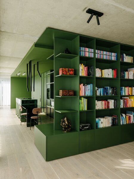 A Big Green Box Adds Flair and Function to an Open-Plan Berlin Apartment