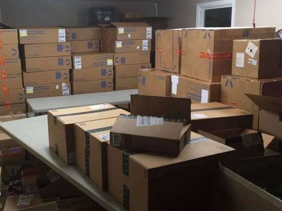 Boxes waiting to be shipped to Amazon fulfillment center in Deanna Slaman's garage.