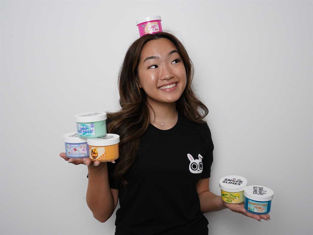 Jungmin Kang posing with some of her products