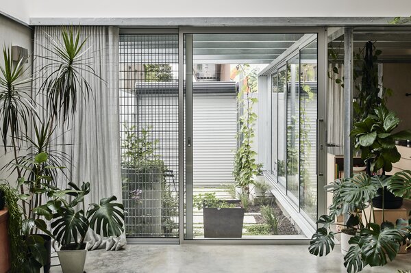 Steel Cladding and a Roller Door Forge a Melbourne Home With Its Industrial Setting