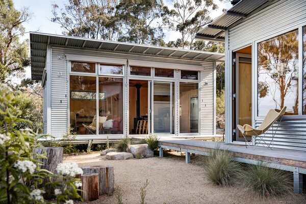 A Corrugated Steel Shell Gives Way to Warm Timber Interiors at This Cabin Retreat in Tasmania