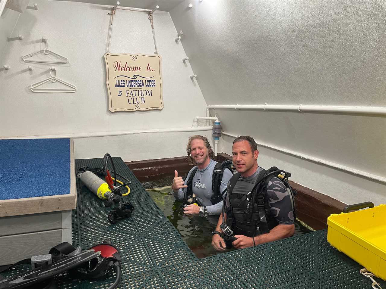 Joe Dituri and Jason Sonners, a certified hyperbaric practitioner, accessing the lodge through its moon pool. Dituri will host many visiting scientists during his stay at the lodge.