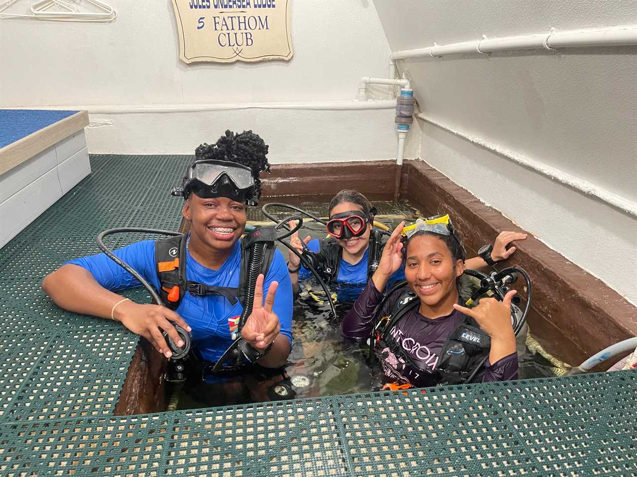 Young students access the lodge through the moon pool.