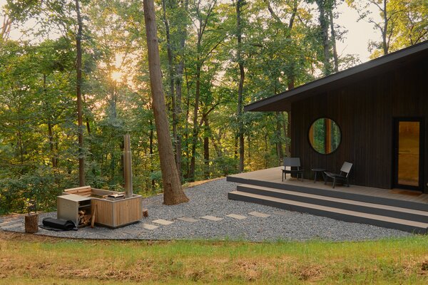 After staying in a tree house listed on Airbnb, Remo Kommnick and Emi Moore wanted their own getaway in the woods. "It was amazing being up in the trees,