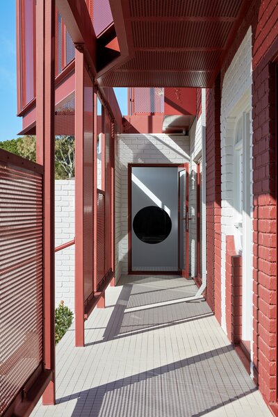 Metal Screens Form a Skin Around This Revived ’80s-Built Home in Australia