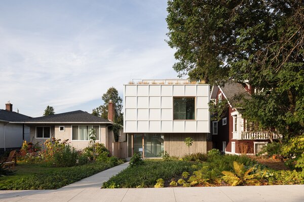 Monika and Darren Bennett worked with SM Studio on their custom home in Vancouver, B.C. The main house has 2703 square feet, plus a 514 square foot garage/studio on the rear alley, with a courtyard and pool in between the two buildings.