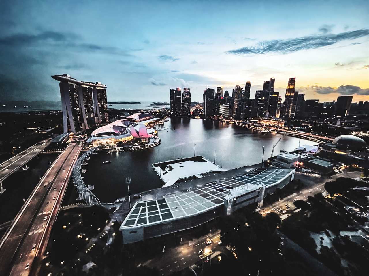 Singapore skyline at dusk.