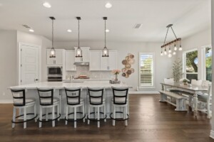 warm kitchen with unique light fixtures