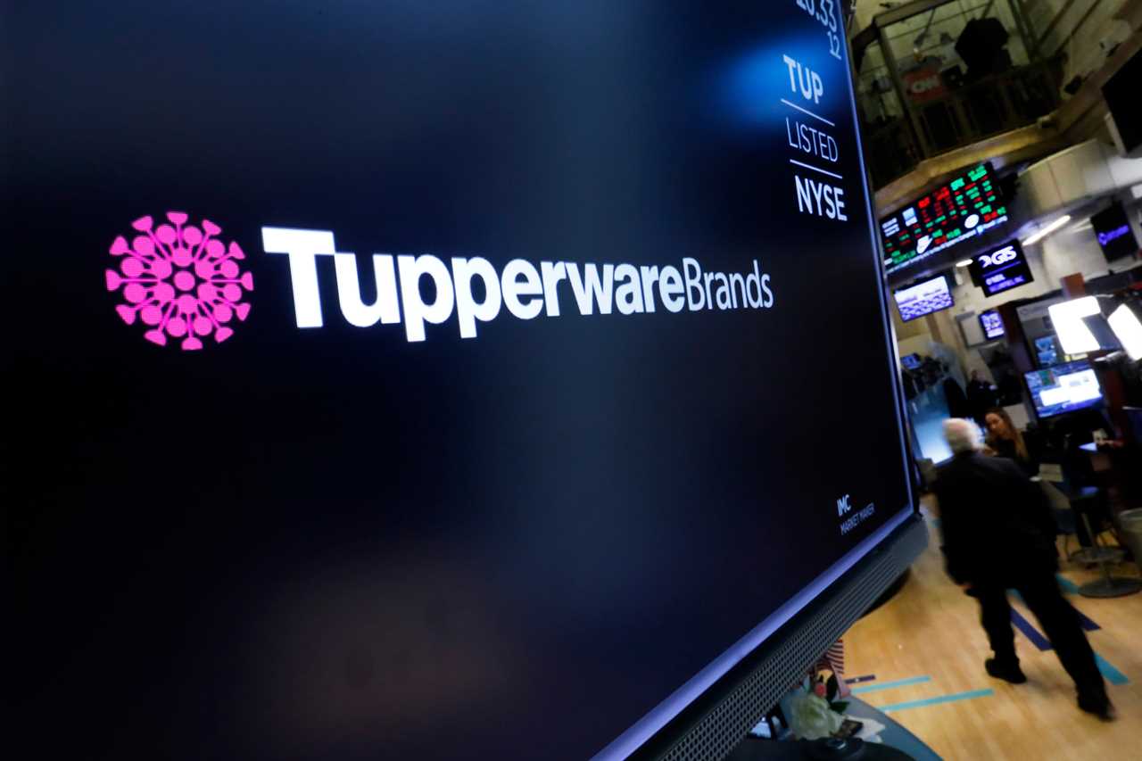 The Tupperware Brands logo and name appears on a screen on the floor of the New York Stock Exchange in 2022.