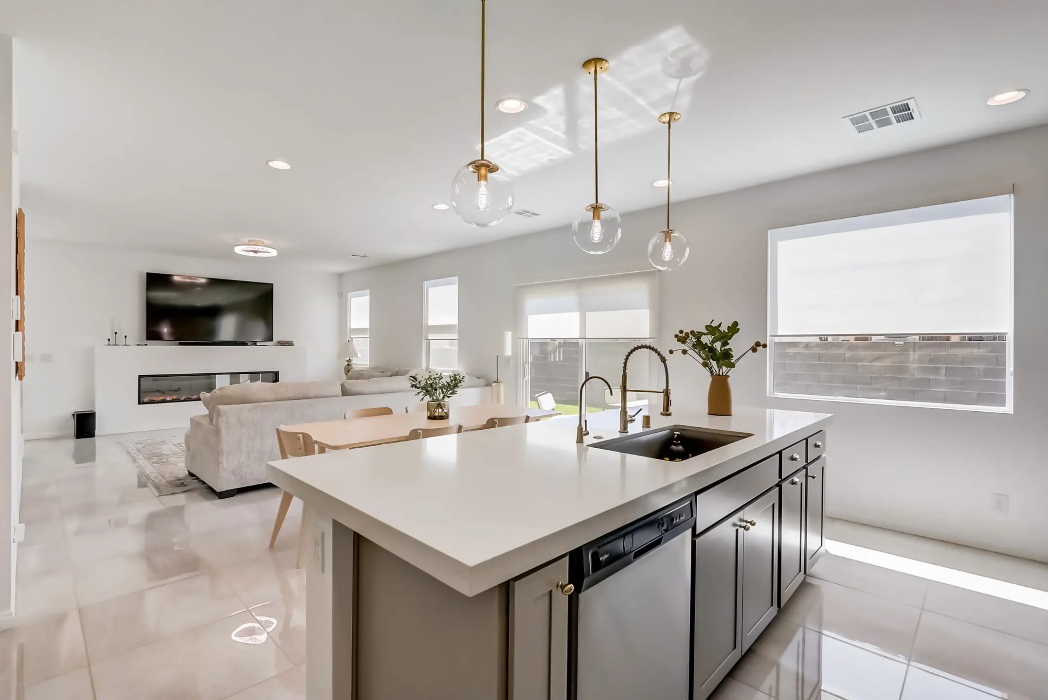 sleek kitchen with large island and open concept layout