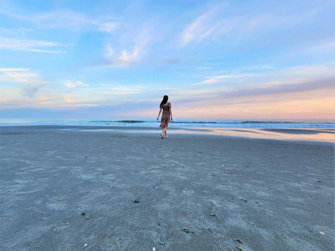 woman walking on a beach