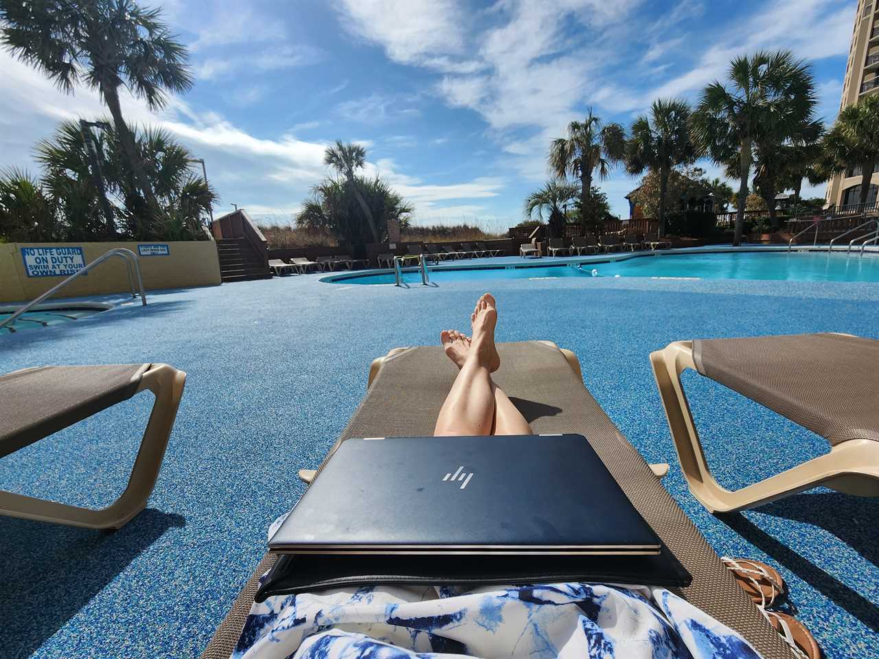 woman working in a pool chair