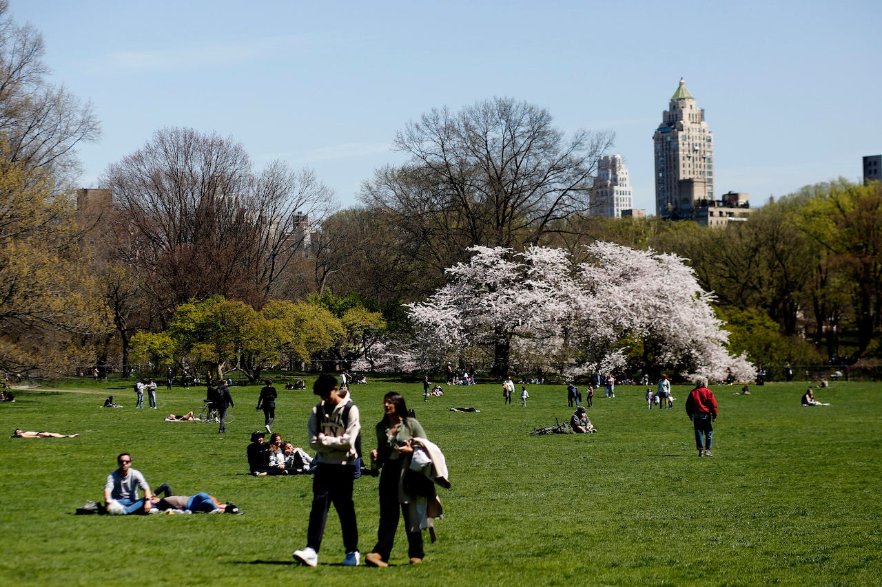 People enjoy a sunny day at Central Park on April 10, 2023 in New York City. The city is heading into a week of warm weather.