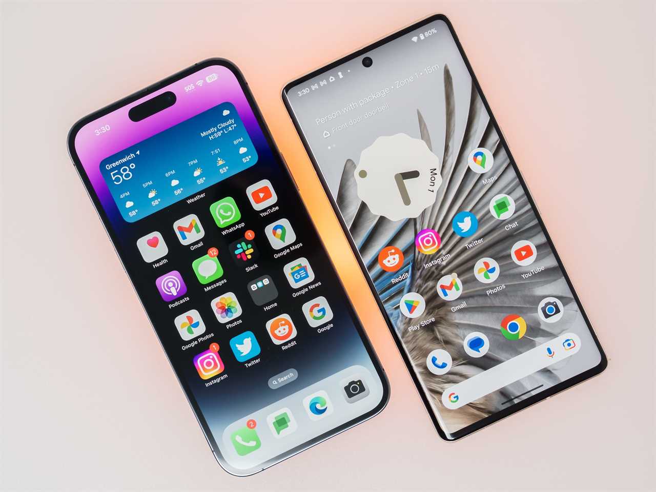 The iPhone 14 Pro Max and Pixel 7 Pro next to each other at an angle with their screens on the home screen.