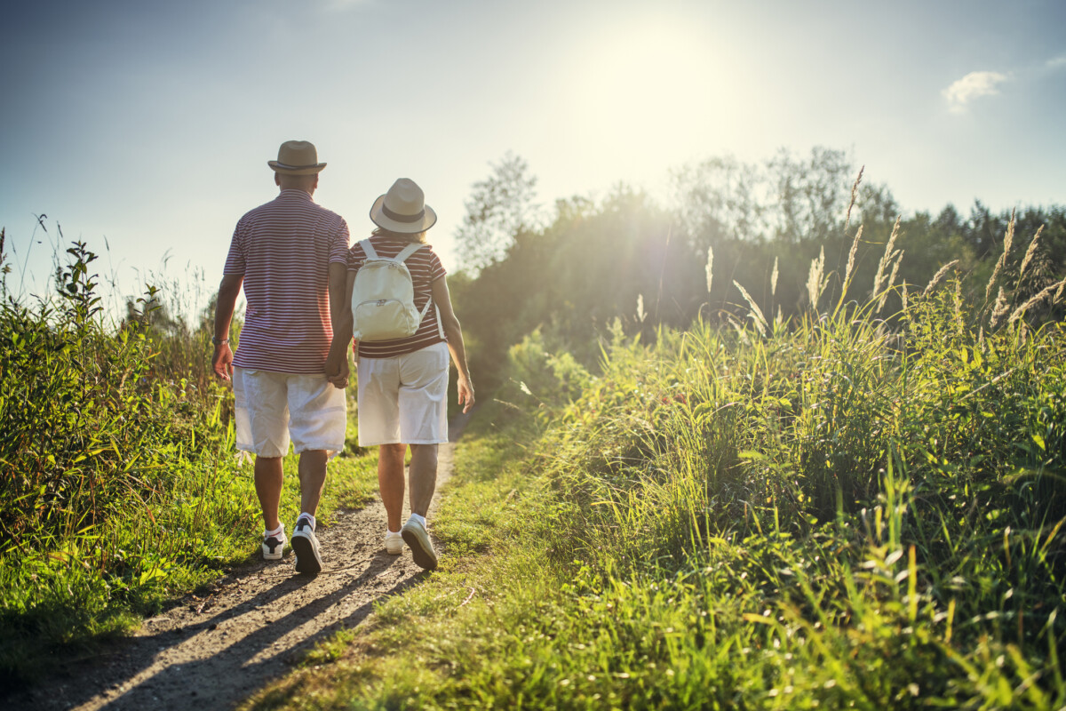 Senior couple enjoying hiking in nature in Grand Rapids