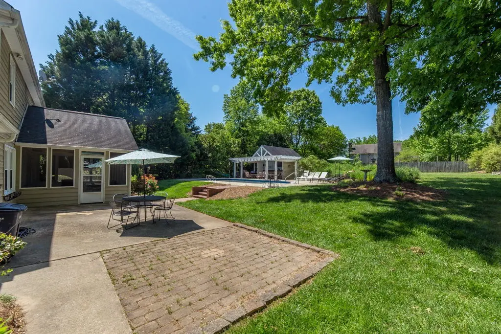 greensboro large backyard screened porch and patio and pool