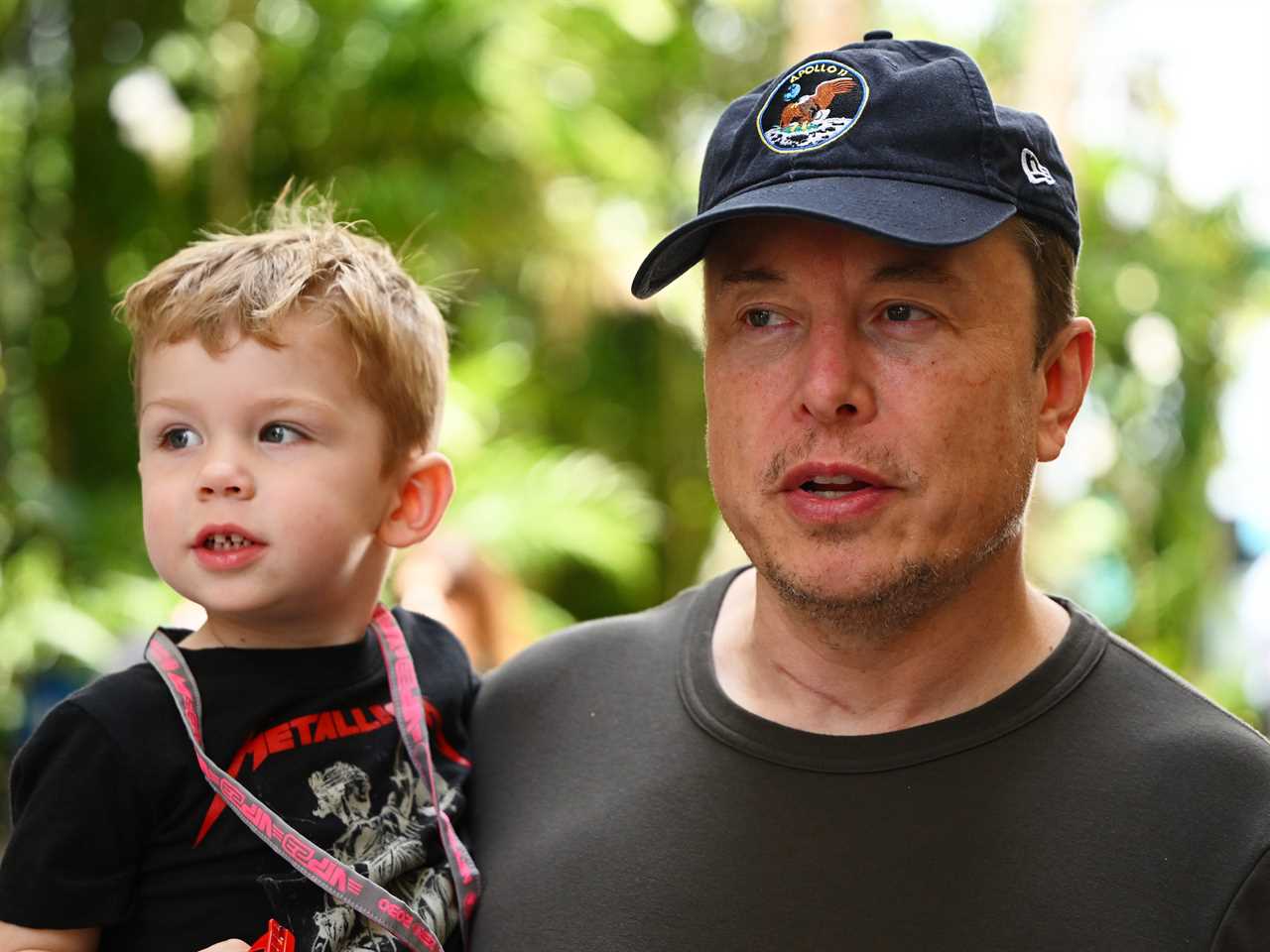 Elon Musk and his three-year-old son at F1 Grand Prix of Miami.