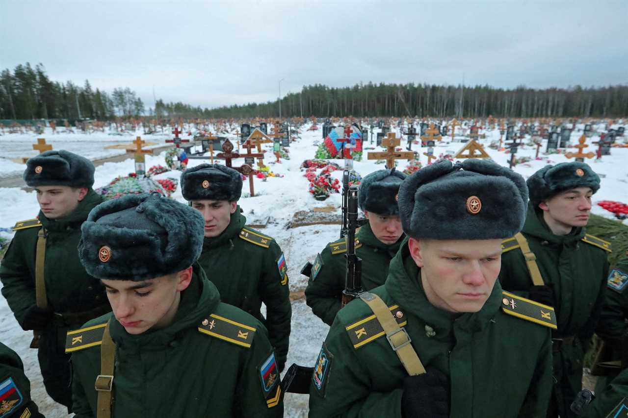 Cadets of a military academy attend the funeral of Dmitry Menshikov, a mercenary for the private Russian military company Wagner Group, killed during the military conflict in Ukraine, in the Alley of Heroes at a cemetery in Saint Petersburg, Russia December 24, 202