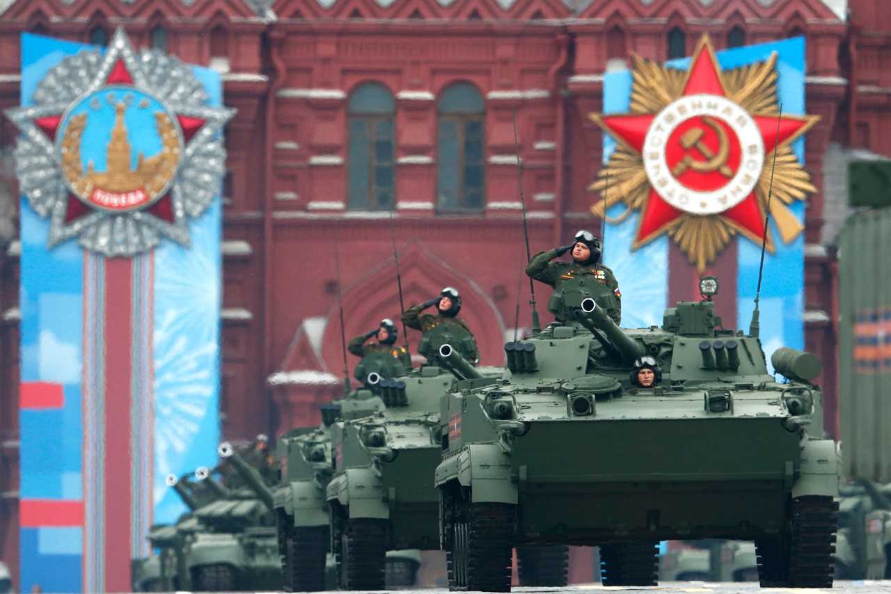 Russian tanks roll in Red Square during the Victory Day military parade in Moscow, Russia, Sunday, May 9, 2021.