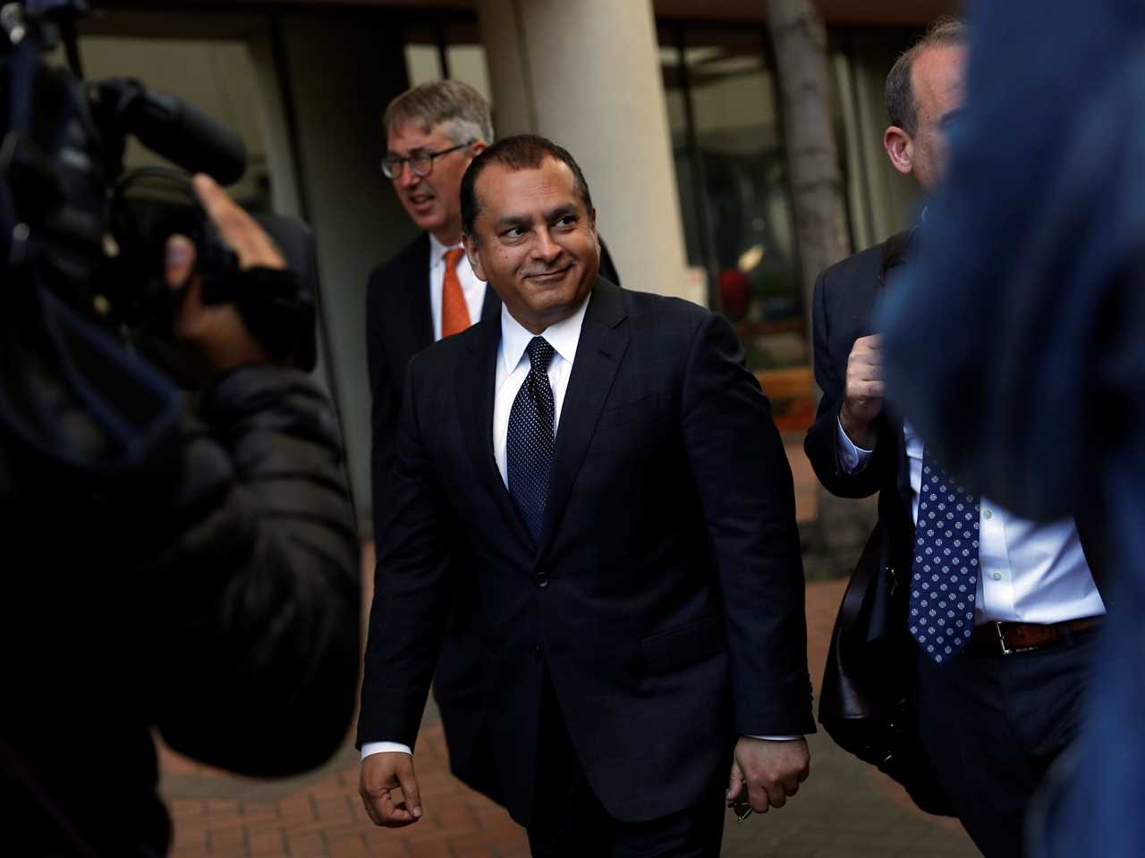 Former Theranos President and COO Ramesh "Sunny" Balwani smiles after a hearing at a federal court in San Jose, California, U.S., July 17, 2019.