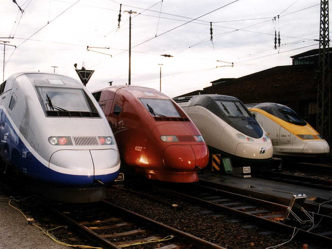 TGV Duplex, Thalys, ETR 500, and Eurostar trains at the Eurailspeed 1998 exhibition in Berlin in October 1998.