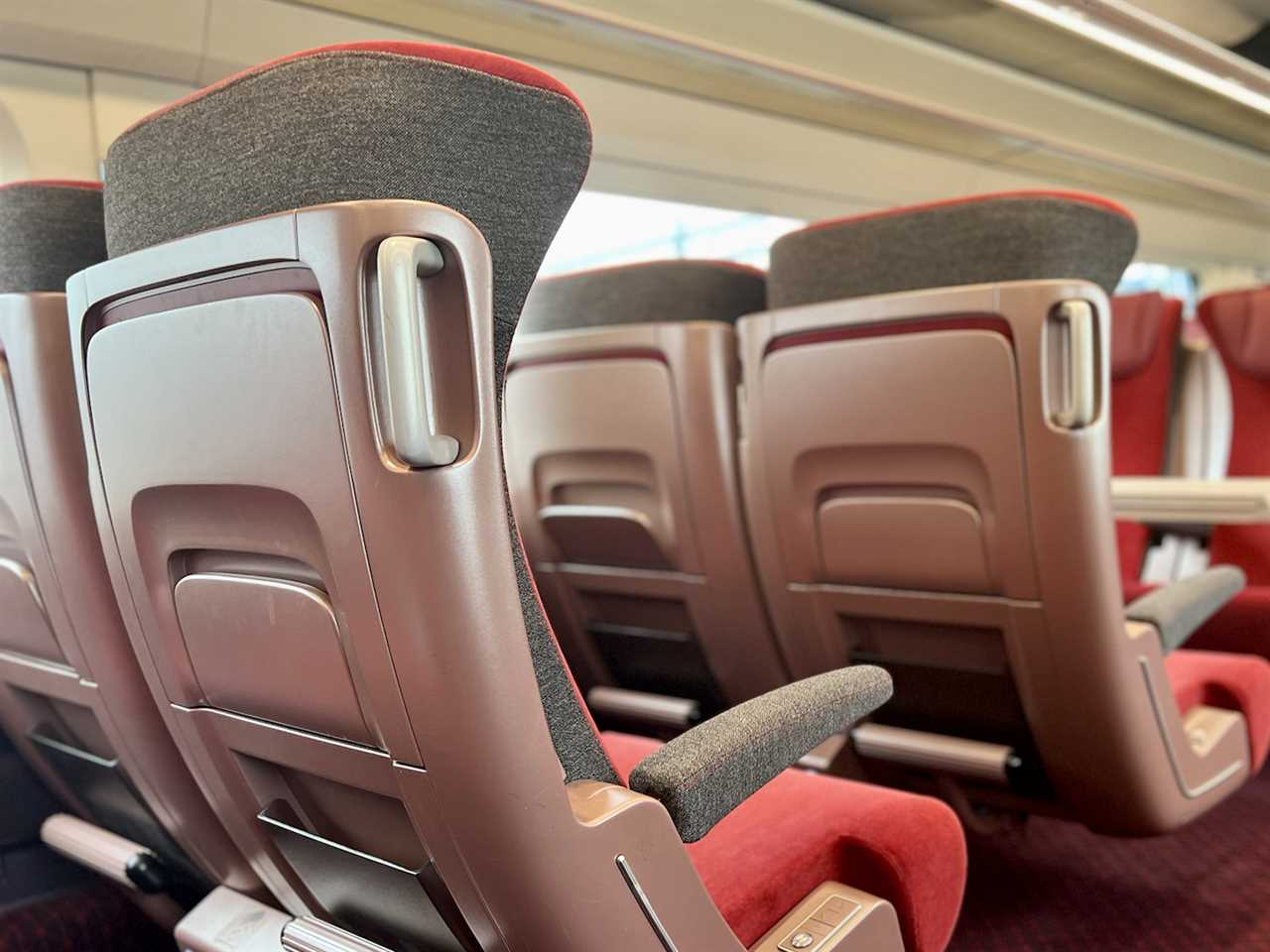 Forward-facing first class seats on a Thalys train.