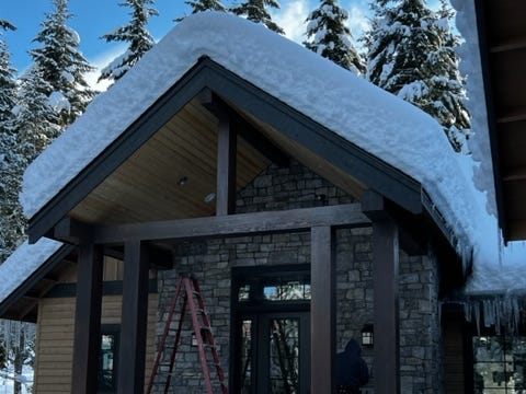 Snowy winter shot of front of house.