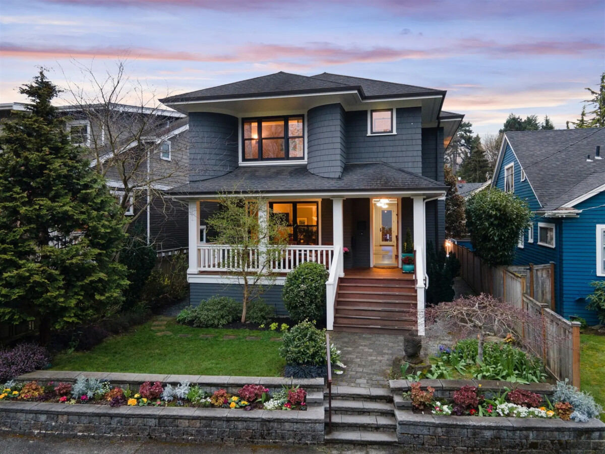 gray craftsman home with plants in massachusetts