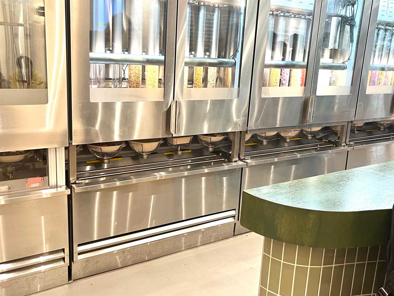 sweetgreen naperville infinite kitchen bowls line up conveyor