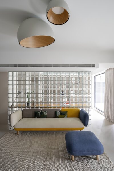 A layout that flows and the use of glass blocks brightens up the living and study rooms. 