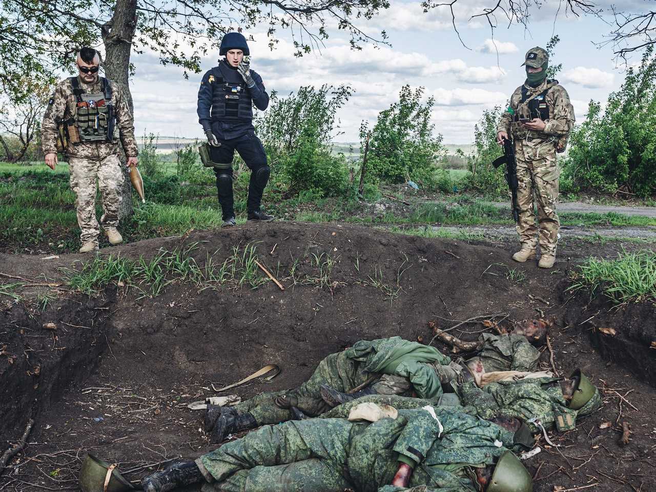 Russian soldiers troops grave cemetery Kharkiv Ukraine
