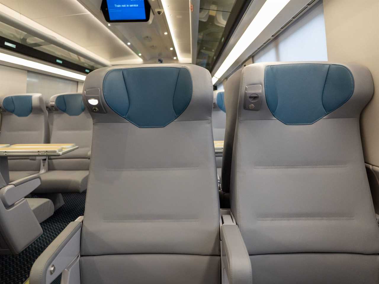 Rows of business class seats inside the new Amtrak Acela.