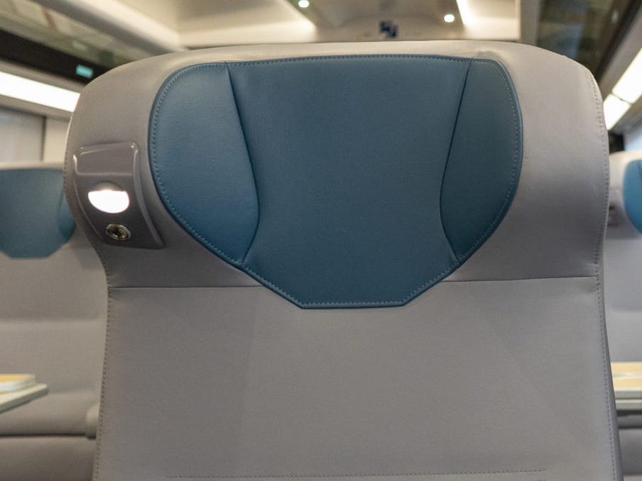 Rows of business class seats inside the new Amtrak Acela.