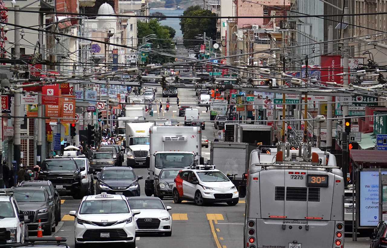 A Cruise self-driving car in the middle of traffic in San Francisco.