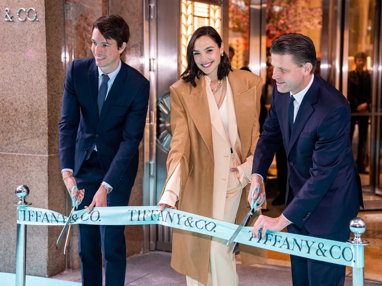 Alexandre Arnault, Gal Gadot, and Anthony Ledru cut blue ribbon outside Tiffany store