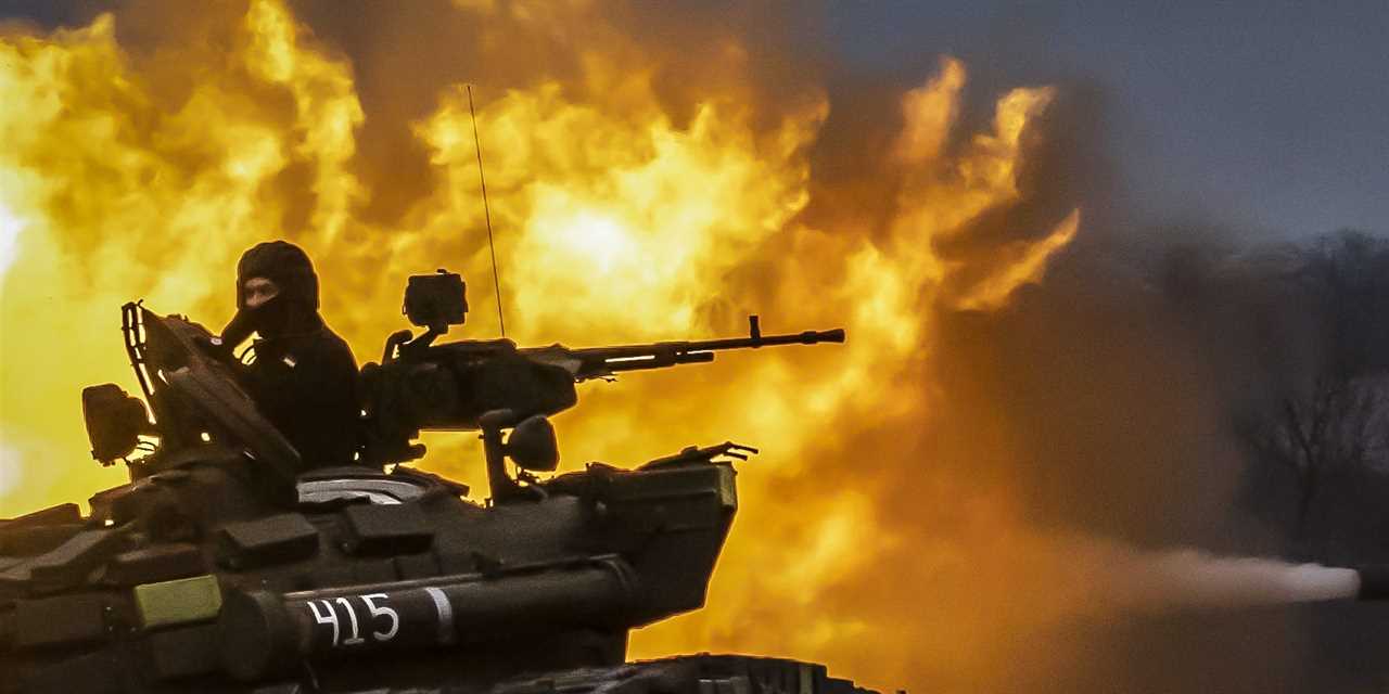 A Ukrainian soldier on a tank performs firing practice near the frontline area in Zaporizhzhia, Ukraine on March 29, 2023.