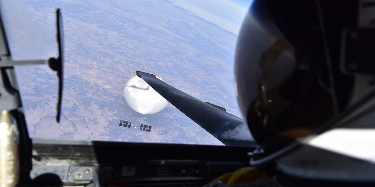 A US Air Force pilot looked down at the suspected Chinese surveillance balloon as it hovered over the Central Continental United States February 3, 2023. Recovery efforts began shortly after the balloon was downed.