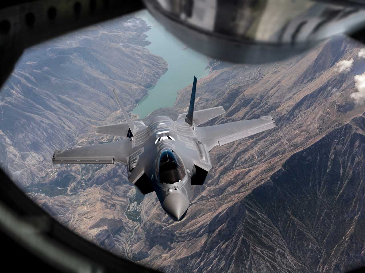 F-35 jet fighter refueling mid-air.