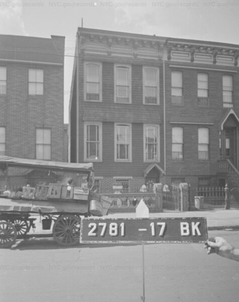 A historic image of the couple’s home inspired the remodel process. Note how the window pattern was originally laid out.