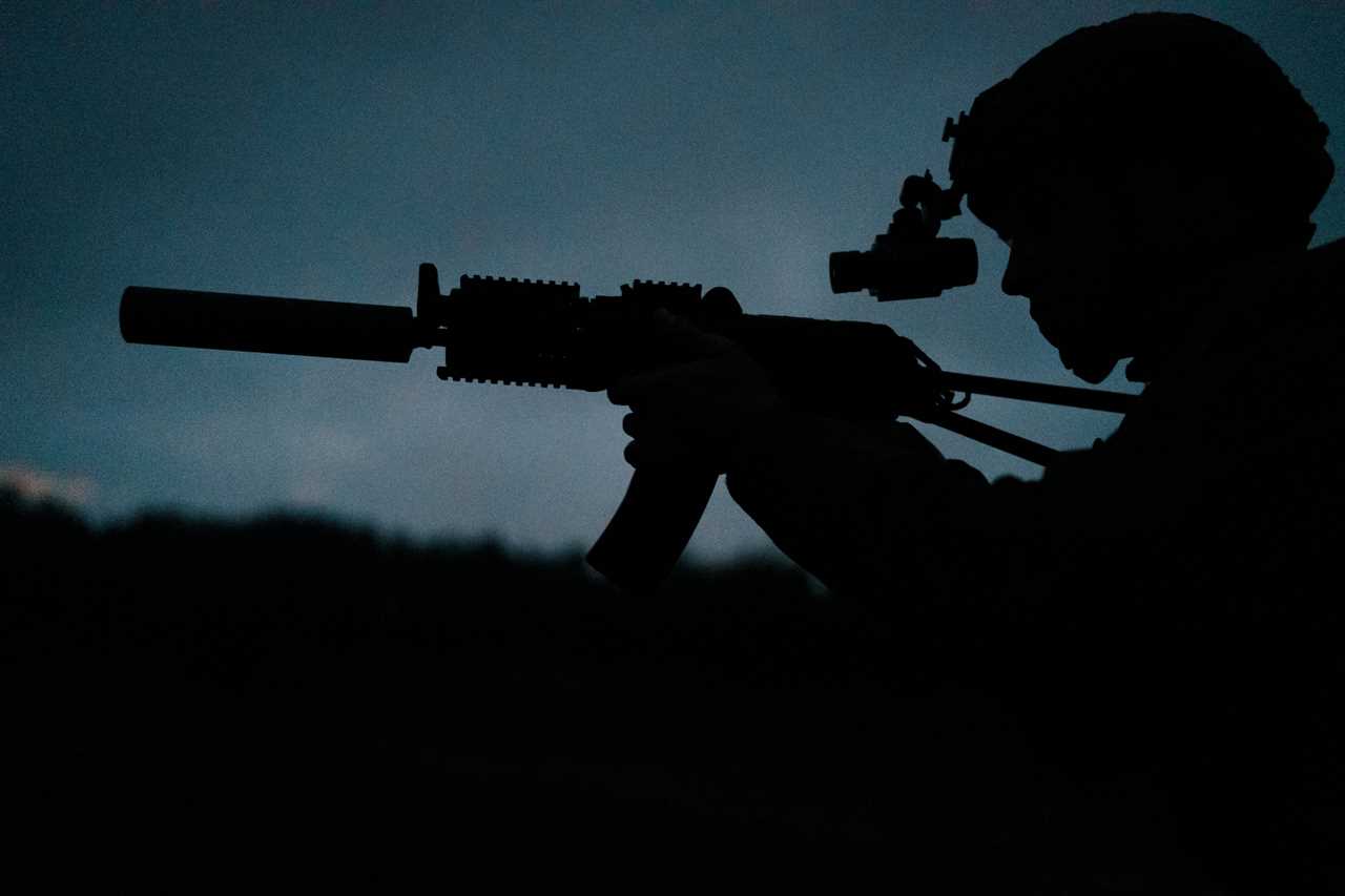 Ukrainian military member looking in a thermal weapon sight during advanced training in military tactics on September 11, 2022, in Kyiv Oblast, Ukraine.